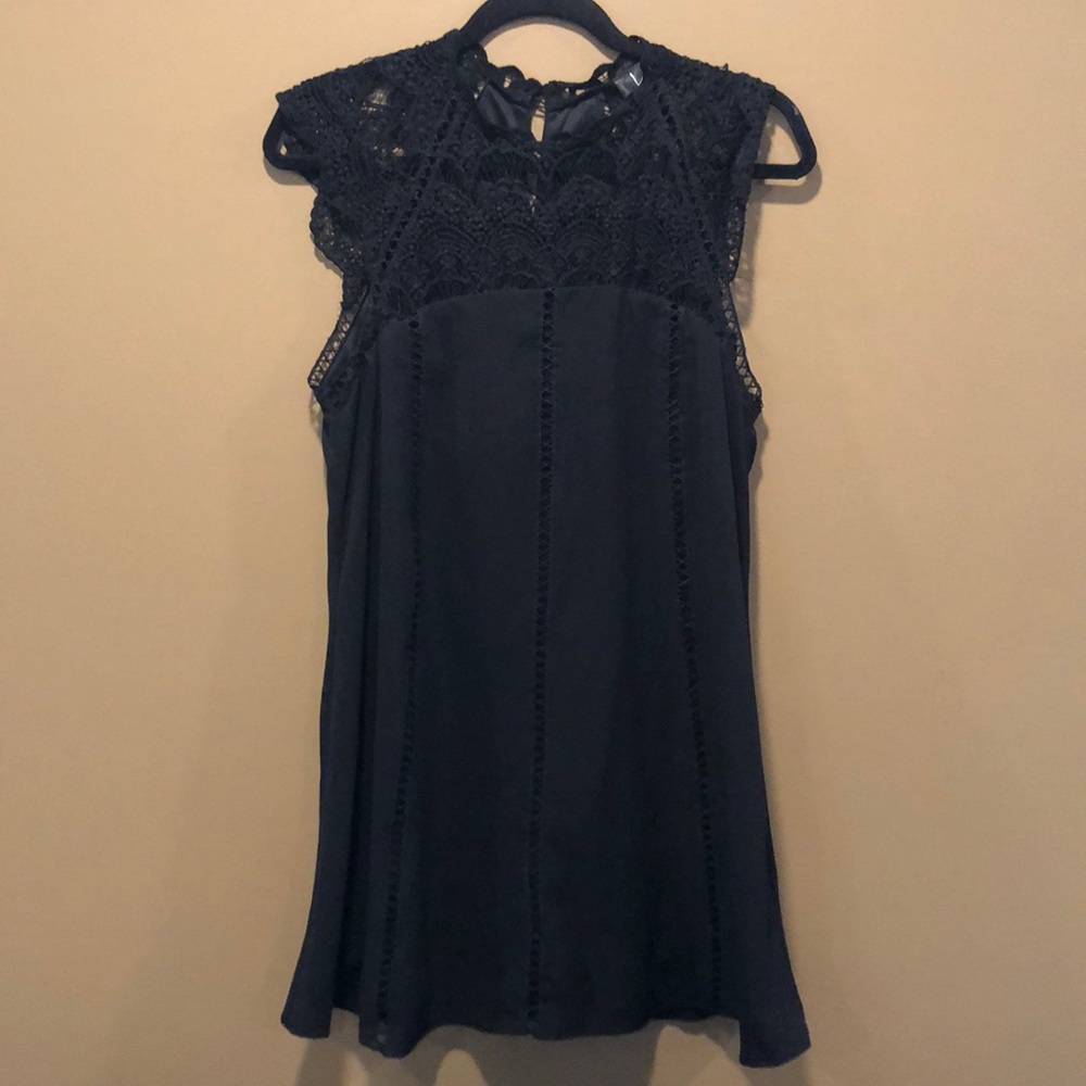 Lulu’s black lace swing dress.